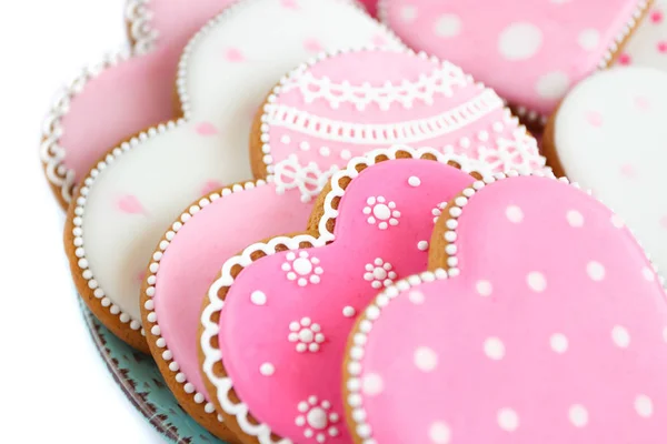 Set di biscotti a forma di cuore rosa con motivi, fatti a mano — Foto Stock