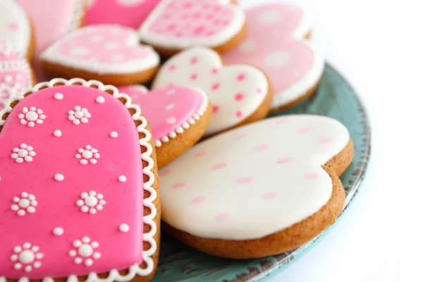 Set de galletas en forma de corazón rosa con patrones, hechas a mano —  Fotos de Stock