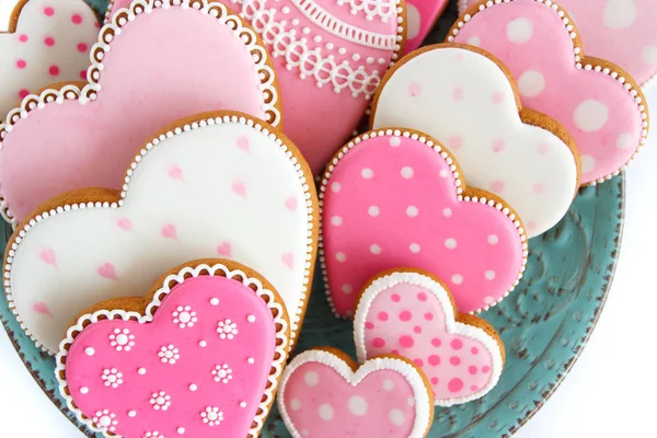 Conjunto de biscoitos em forma de coração rosa com padrões, feitos à mão — Fotografia de Stock