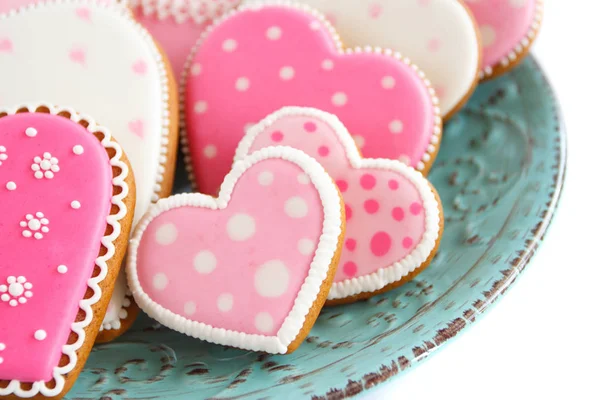 Conjunto de biscoitos em forma de coração rosa com padrões, feitos à mão — Fotografia de Stock