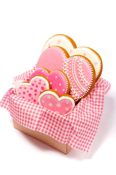 Set of pink heart shaped cookies with patterns, light background — Stock Photo, Image