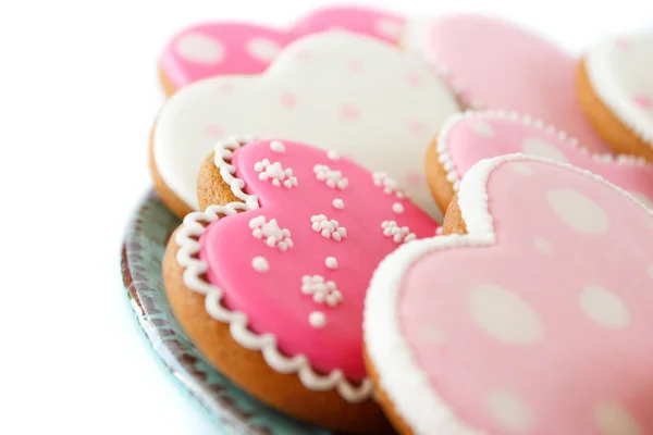 Set de galletas en forma de corazón rosa con patrones, hechas a mano — Foto de Stock