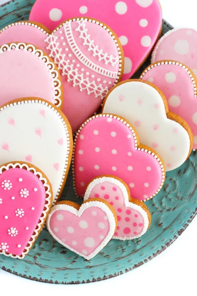 Sada růžových sušenek ve tvaru srdce se vzory, ruční výroba — Stock fotografie