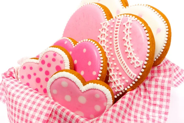 Set de galletas en forma de corazón rosa con patrones, hechas a mano — Foto de Stock