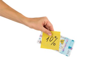 Elinde farklı finansal işaretler ve semboller olan bin tane hrivniya ve çıkartma.