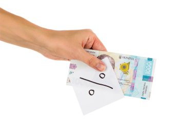 Elinde farklı finansal işaretler ve semboller olan bin tane hrivniya ve çıkartma.