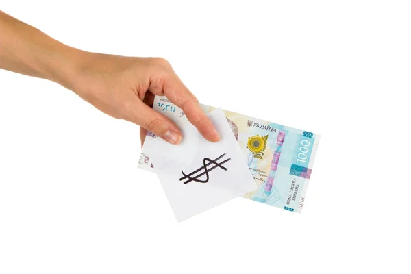 Тисячі гривень і наклейка з різними фінансовими знаками і символами в руці — стокове фото