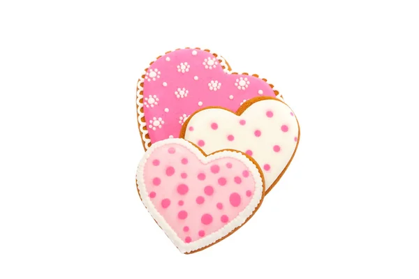 ピンクのクッキーの心の異なるパターンを持つ形からの背景,孤立 — ストック写真