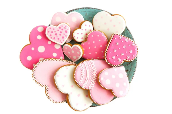 Ensemble de biscuits roses en forme de coeur avec motifs, faits à la main — Photo