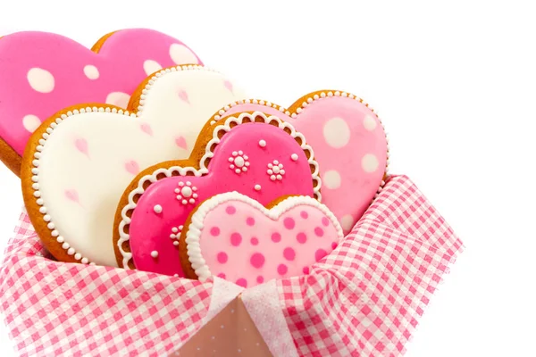 Set de galletas en forma de corazón rosa con patrones, hechas a mano — Foto de Stock