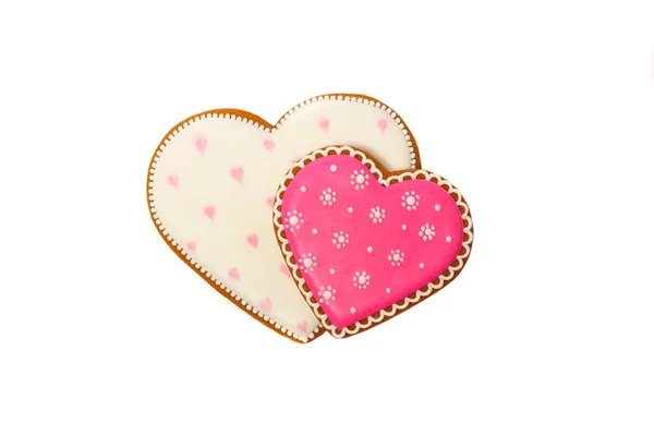 Fond de biscuits roses en forme de coeur avec des motifs différents, isolé sur blanc — Photo