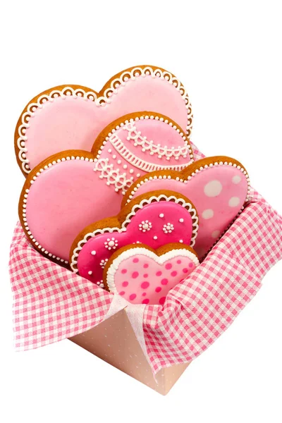 Conjunto de biscoitos em forma de coração rosa com padrões, artesanal, fundo claro — Fotografia de Stock