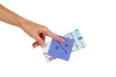 Elinde farklı finansal işaretler ve semboller olan bin tane hrivniya ve çıkartma.