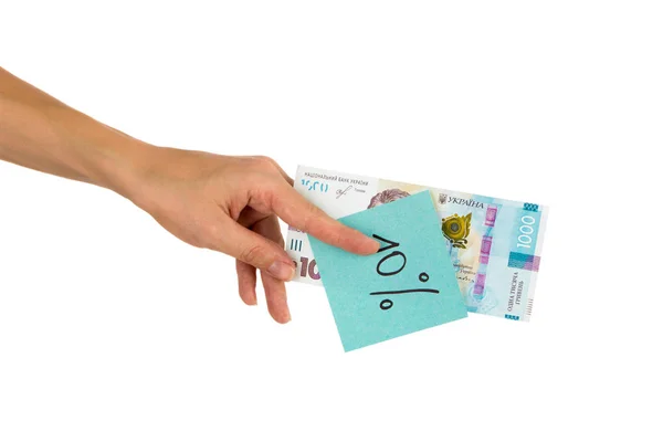 Duizend hryvnias en sticker met verschillende financiële tekens en symbolen in de hand — Stockfoto