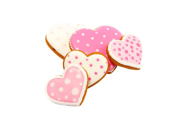 Background from pink cookies heart shaped with different patterns, isolated — Stock Photo, Image