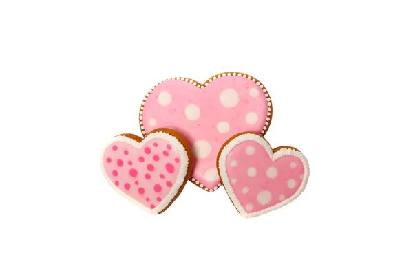 Fond de biscuits roses en forme de coeur avec des motifs différents, isolé — Photo