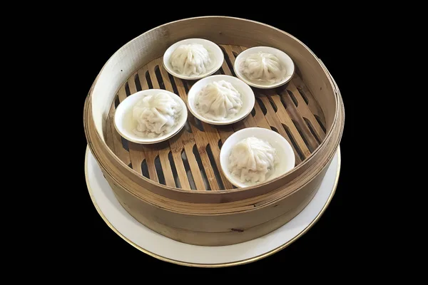 Chinese steamed bun named Xiaolongbao isolated on black backgrou — Stock Photo, Image