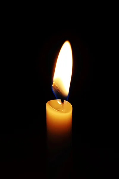 Candle in black background — Stock Photo, Image