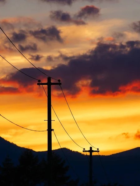 Pólo de energia e pôr do sol — Fotografia de Stock