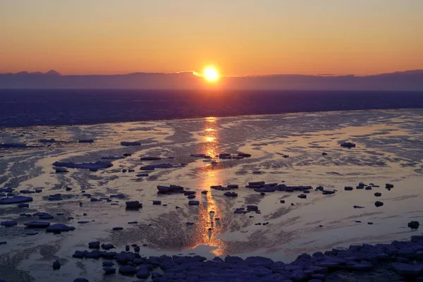 drift ice and sunrise in winter hokkaio