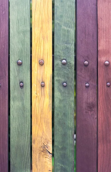 A színes kerítés nails közelről — Stock Fotó