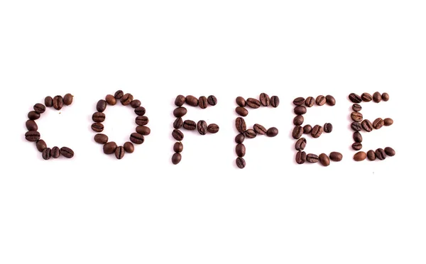 Text made of coffee beans: COFFEE. Texture of the coffee beans o — Stock Photo, Image