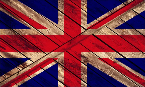 Η βρετανική σημαία σε φόντο ξύλινη, λευκό, κόκκινο, μπλε χρώματα — Φωτογραφία Αρχείου