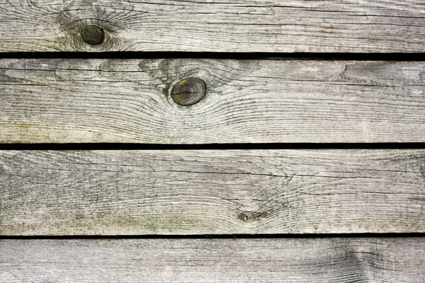 Struttura di fondo in legno naturale di recinzione non tinta con nai arrugginito — Foto Stock