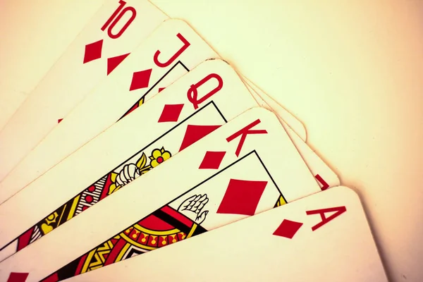 Playing cards close up detail. Black and red cards with a little