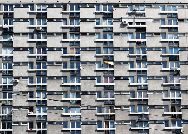 Old Polish building with many windows detail. Post socialistic E — Stock Photo, Image