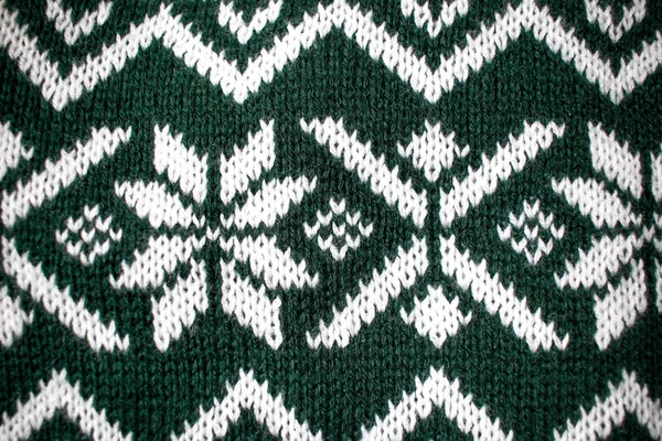 Zielony Boże Narodzenie biały wzór pulower z bliska tło — Zdjęcie stockowe