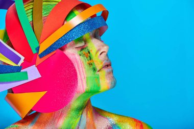 Model with colorful abstract makeup in multicolored helmet clipart