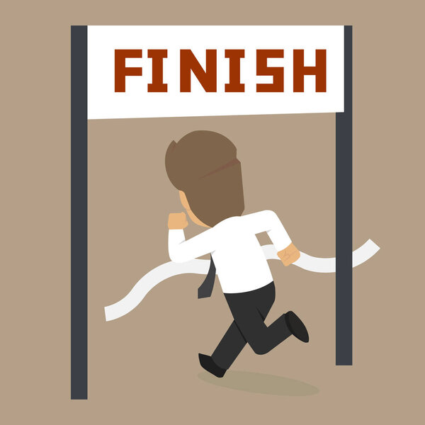 Businessman running at the finish line
