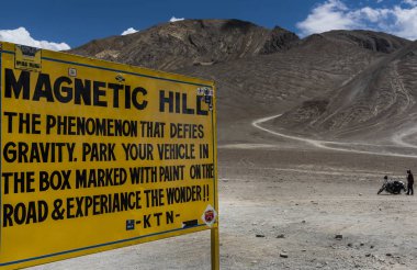 magnetic hill sign board in Leh, ladakh, India, Asia clipart