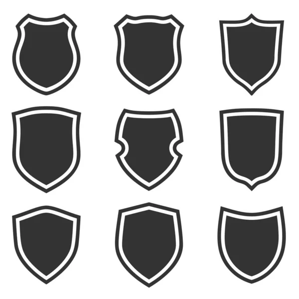 Shield shape icons set. Gray label signs. Symbol of protection — Stock Vector