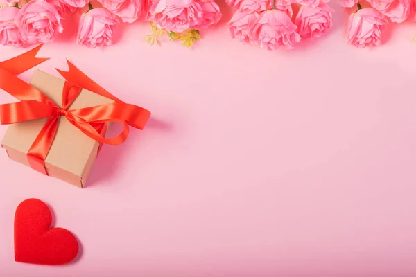 Valentines day and love concept. One small gift box with red hea