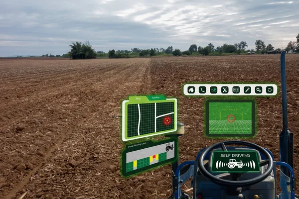 iot smart industry robot 4.0 agriculture concept,industrial agronomist,farmer using autonomous tractor with self driving technology , augmented mixed virtual reality to collect, access, analyze soil