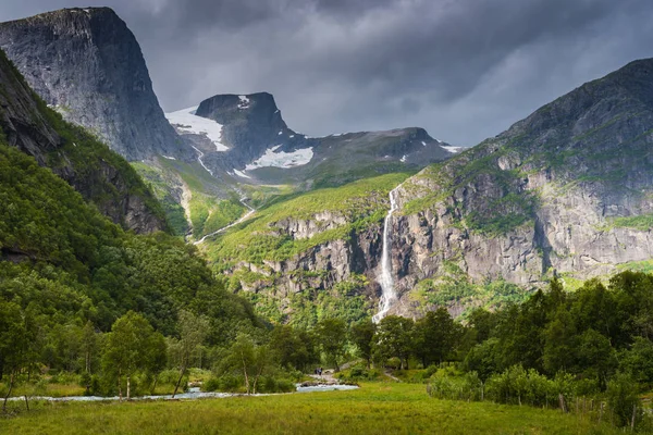Glacier Waterfall and Green Valley. Norway