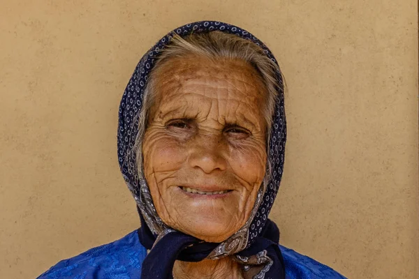 Portrait of  beautiful wrinkled smiling old women