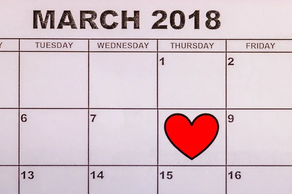 Red lovely heart on 8 March calendar — Stock Photo, Image