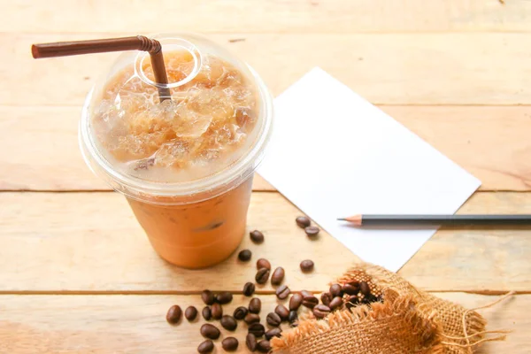 Iced Coffee and blank paper note  On Wooden  Background — Stock Photo, Image