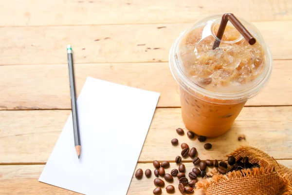 Iced Coffee and blank paper note  On Wooden  Background — Stock Photo, Image