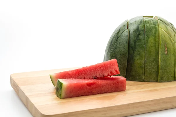 Vattenmelonskiva på träskiva — Stockfoto