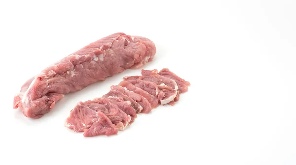 Slice varkensvlees op witte achtergrond — Stockfoto