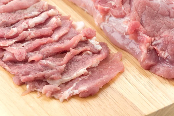 Slice pork on wood board — Stock Photo, Image