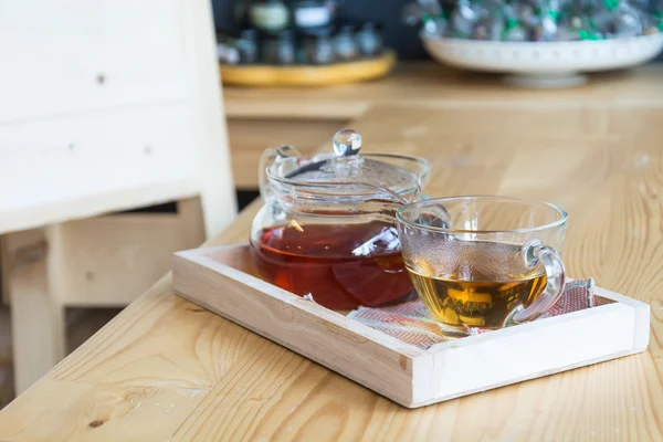 Hot tea on wood table — Stock Photo, Image