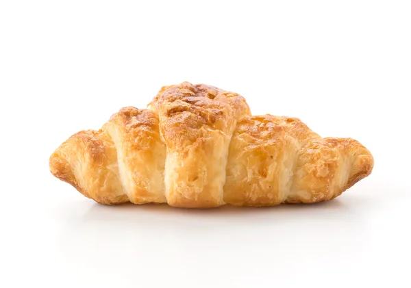 Smör croissant på vit bakgrund — Stockfoto