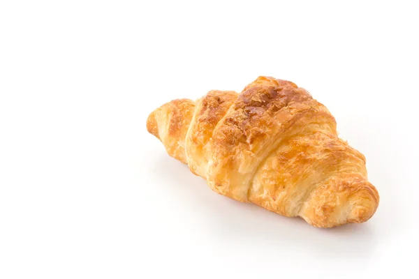 Smör croissant på vit bakgrund — Stockfoto