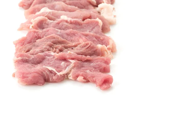 Plátek vepřové maso na bílém pozadí — Stock fotografie
