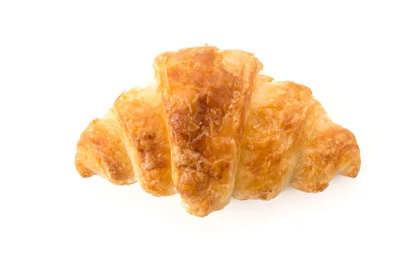 Croissant de beurre sur fond blanc — Photo